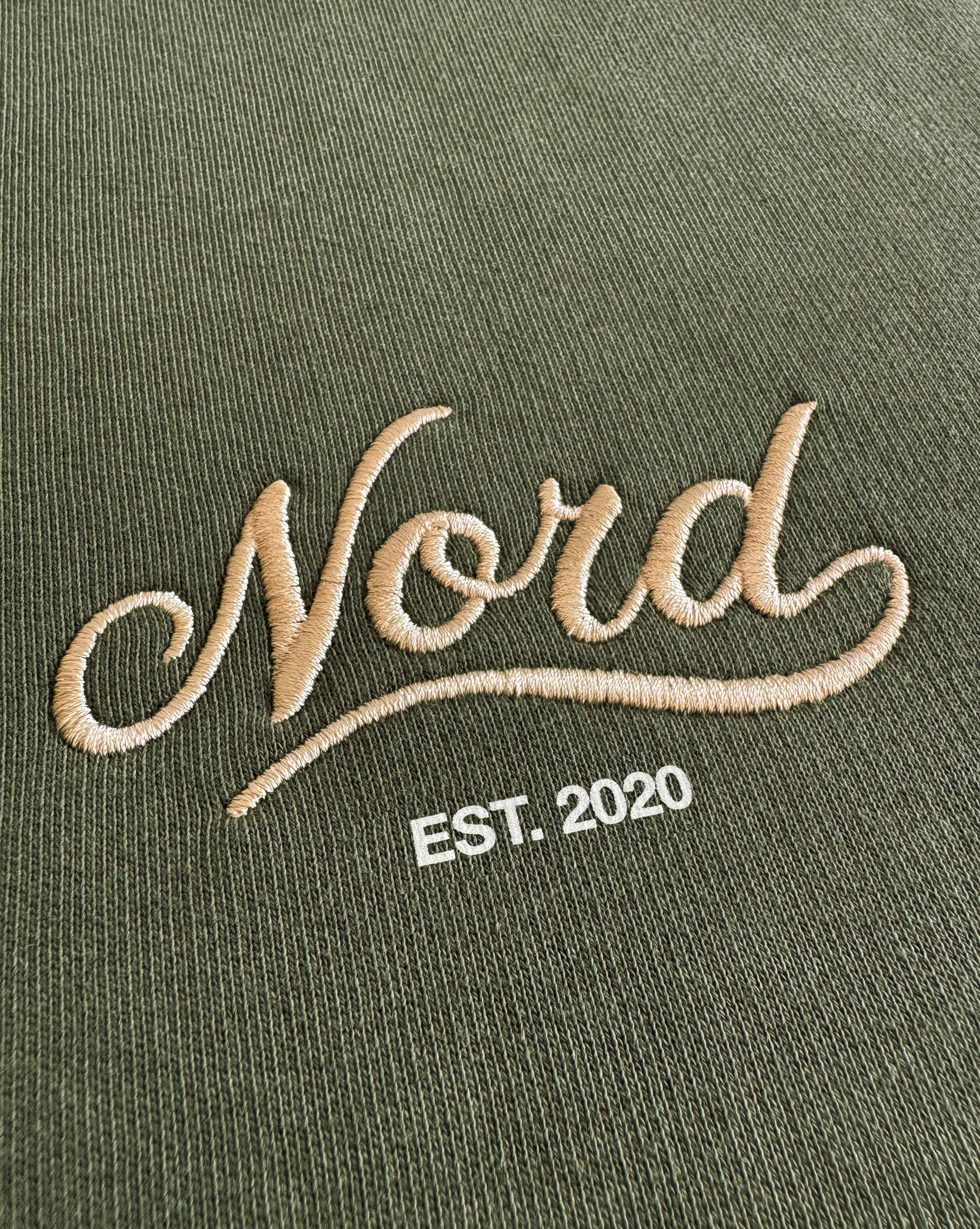 NRD_013_dessuadora_oversize_nordsignature_caquiorganic_detall.jpg